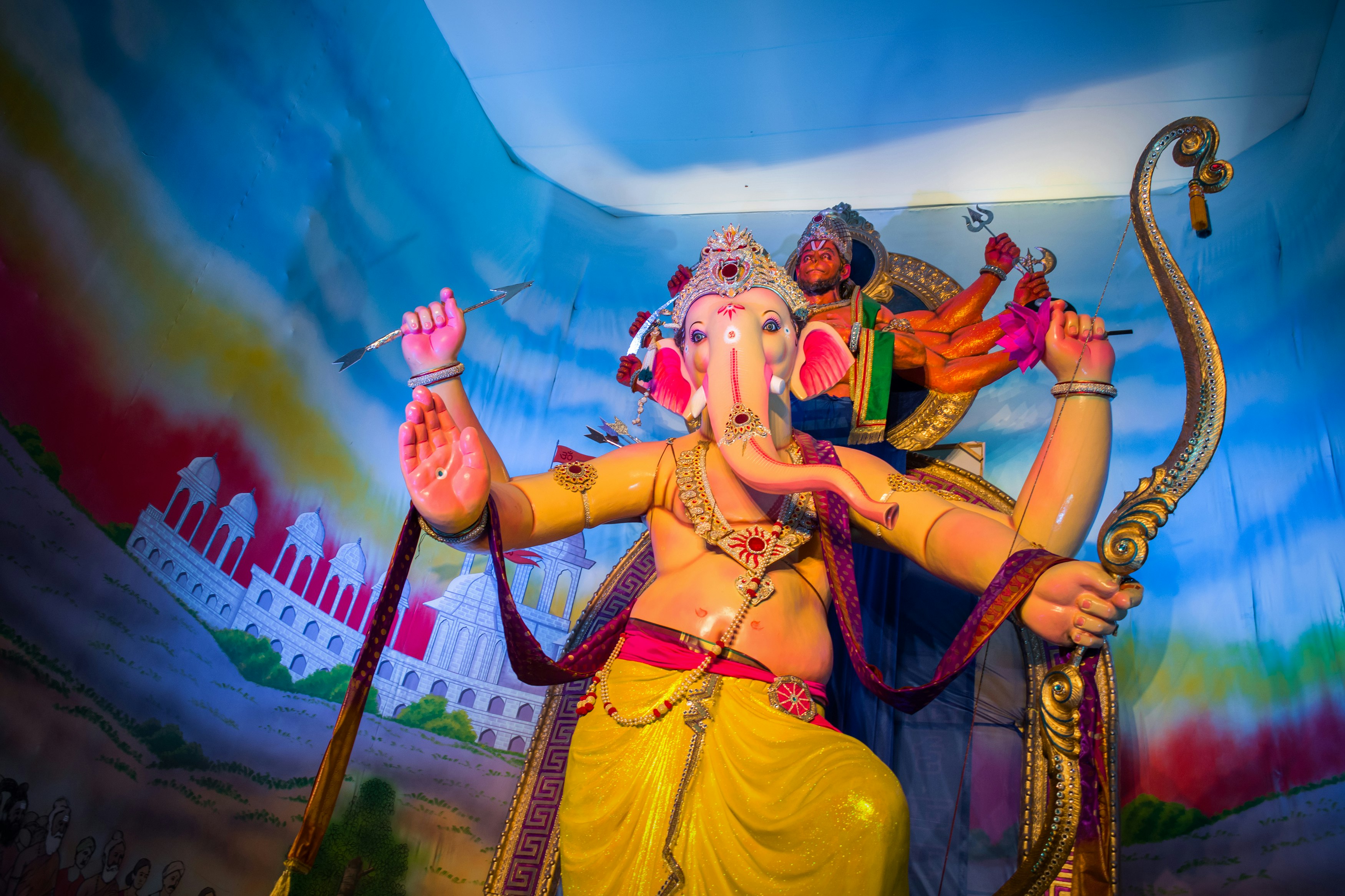 woman in yellow dress dancing with woman in yellow dress